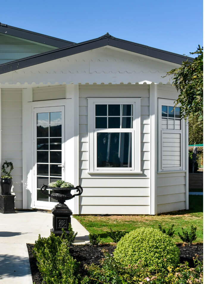 Duco Hinge doors with glass panels in a house setting